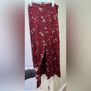 XL maroon maxi skirt w/ button detailing & front slit. Brand:Mossimo. Never worn